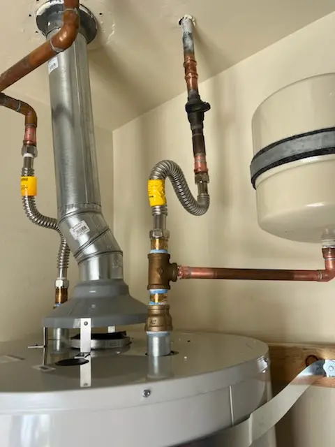 Water heater installation and plumbing repair in Mica